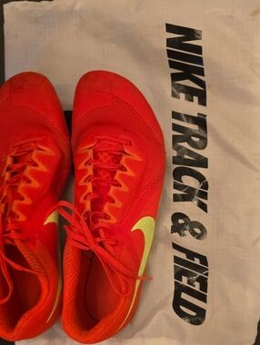 Nike Red Running Spikes with Neon Yellow Swoosh